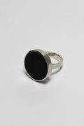 Silver ring with black acrylic front