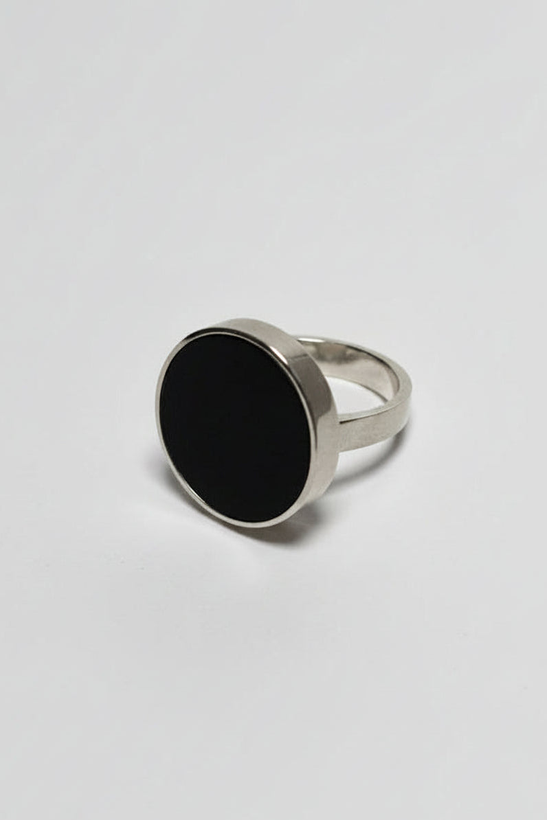 Silver ring with black acrylic front