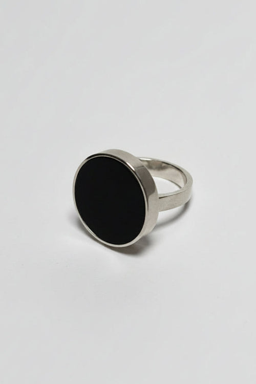 Silver ring with black acrylic front